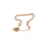 Property of a deceased estate - a 9ct gold chain bracelet with heart locket, approximately 12.8