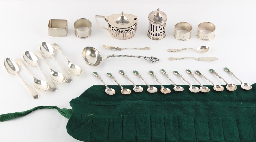 Property of a lady - a mixed lot of silver including a two-piece condiment set and four napkin