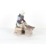 Property of a deceased estate - a Bing & Grondahl Copenhagen figure of a fisherwoman, by Axel