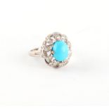 A 14ct white gold turquoise & diamond pierced floral ring, size L/M.