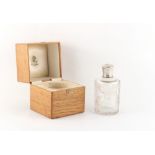 Property of a deceased estate - Faberge - a silver topped clear glass scent bottle by Faberge, the