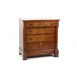 Property of a lady - a small 19th century North European mahogany chest of four long drawers, 35.