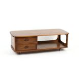 Property of a lady - an Ercol Minerva elm topped coffee table with two drawers, 49ins. (124.5cms.)