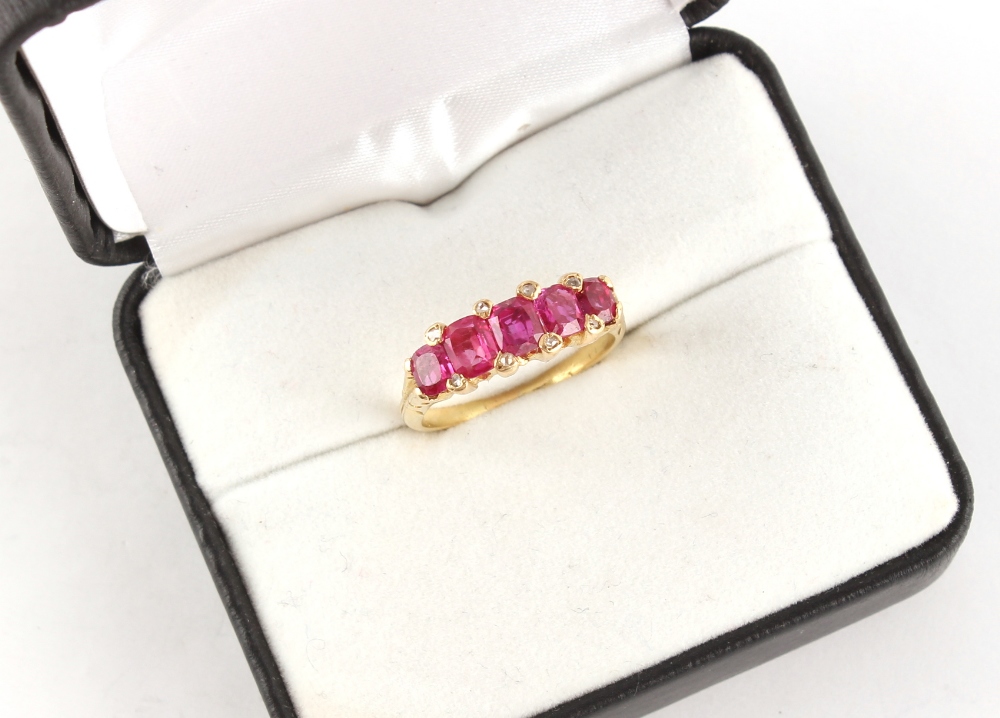 An unmarked yellow gold (tests 18ct) certificated Burmese ruby five stone ring, the five unheated - Image 2 of 2