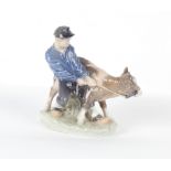 Property of a deceased estate - a Royal Copenhagen model 772 figure of a boy & calf, 6.7ins. (