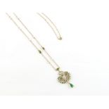 An Art Nouveau enamel pearl & green 'stone' foliate pendant necklace, the chain clasp marked 10K,