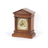 Property of a deceased estate - a walnut cased mantel clock, the Winterhalder & Hofmeier 8-day