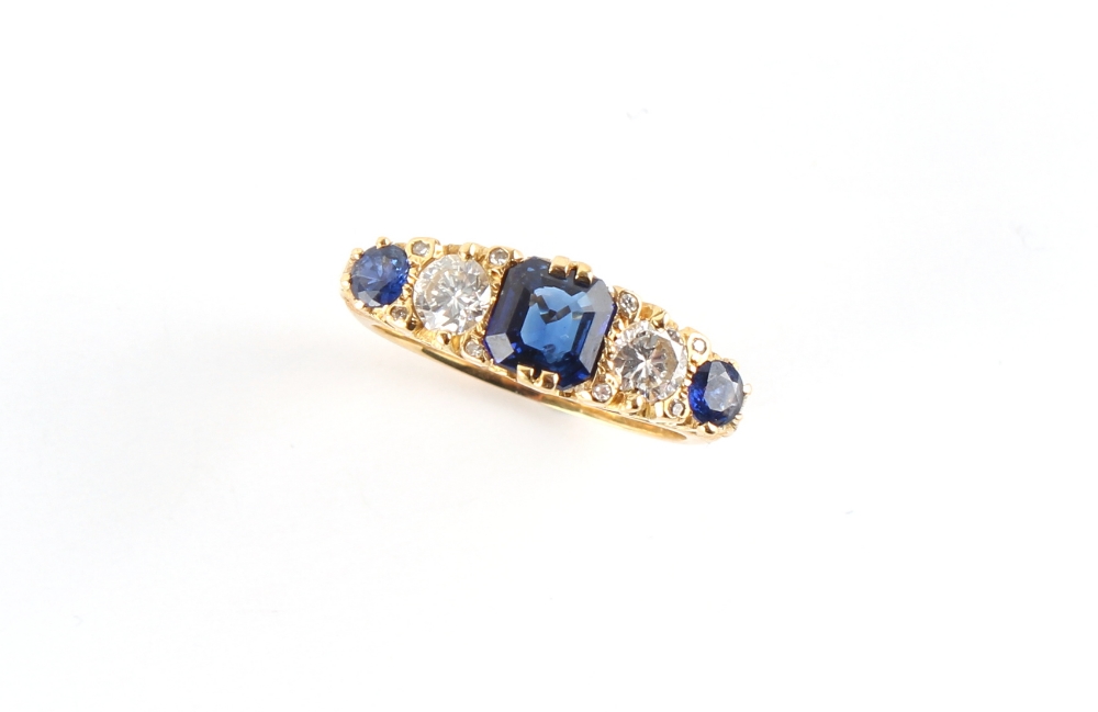 Property of a lady - an 18ct yellow gold sapphire & diamond ring, the emerald cut centre sapphire - Image 2 of 2