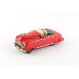 A 1950's Schuco Radio 4012 toy model car, 6.25ins. (15.9cms.) long.