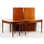 Property of a lady - an early 19th century George III/IV mahogany 'D'-end dining table with two