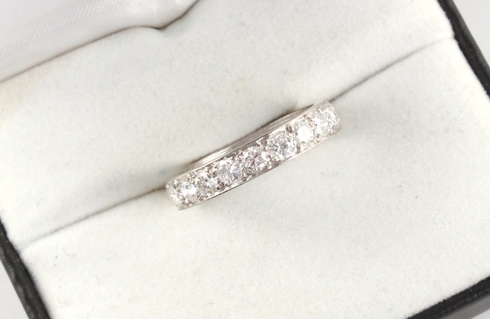 An 18ct white gold diamond eternity ring, the round brilliant cut diamonds weighing an estimated - Image 2 of 2