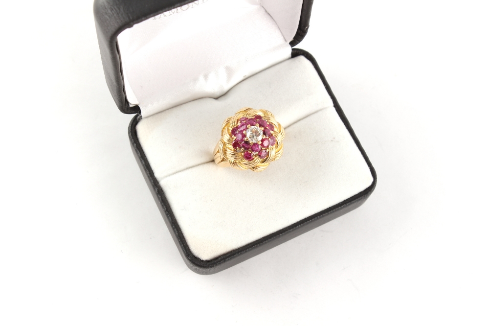 An unmarked yellow gold (tests 18ct) ruby & diamond knot ring, the round cut rubies weighing an - Image 2 of 2