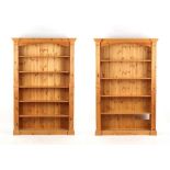 Property of a lady - a pair of modern pine open bookcases, each 51.35ins. (130.5cms.) wide (