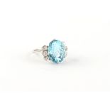 A fine aquamarine & diamond ring, the oval cut aquamarine of vibrant colour & excellent clarity,