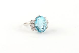 A fine aquamarine & diamond ring, the oval cut aquamarine of vibrant colour & excellent clarity,