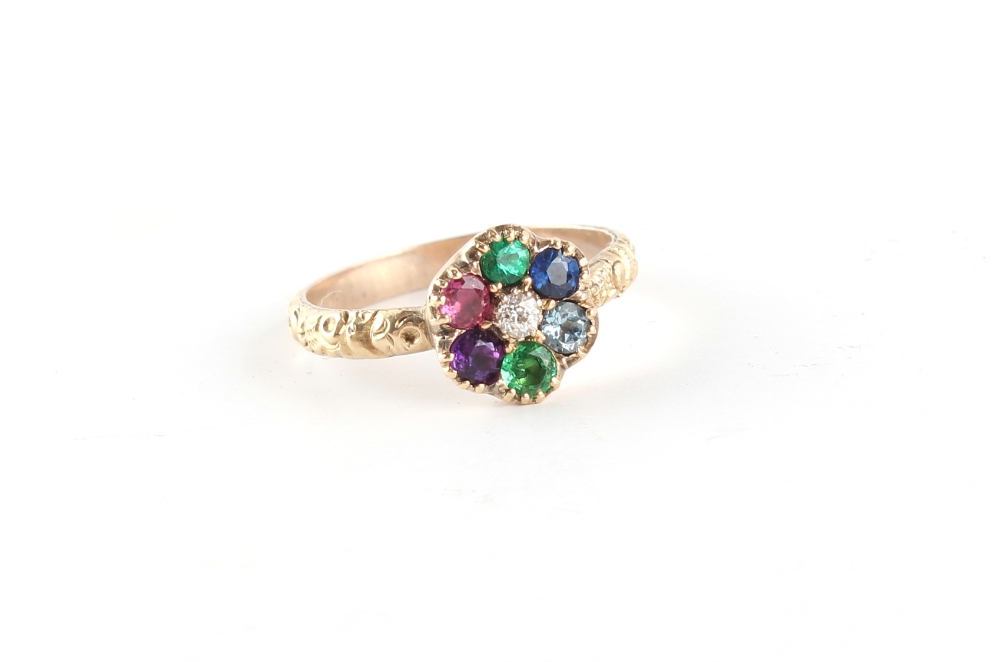 A late 19th / early 20th century unmarked yellow gold multi gem set DEAREST cluster ring, the stones