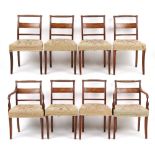 A set of eight early 19th century Regency period mahogany rope-back dining chairs with reeded