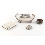 Property of a lady - a bag containing a silver pierced dish, a silver cigarette case, a silver napki