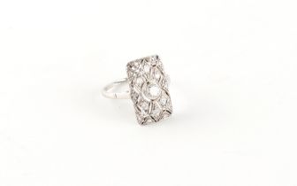 An Art Deco style 18ct white gold diamond pierced rectangular panel ring, the centre stone