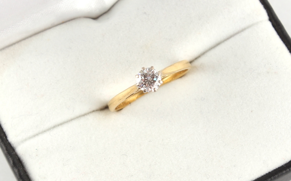 An 18ct yellow gold diamond single stone ring, the round brilliant cut diamond weighing - Image 2 of 2