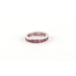 An 18ct white gold ruby eternity ring, the square cut rubies weighing an estimated total of 2.20