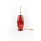 Property of a deceased estate - a large Poole Pottery red glazed table lamp, 25.6ins. (65cms.)