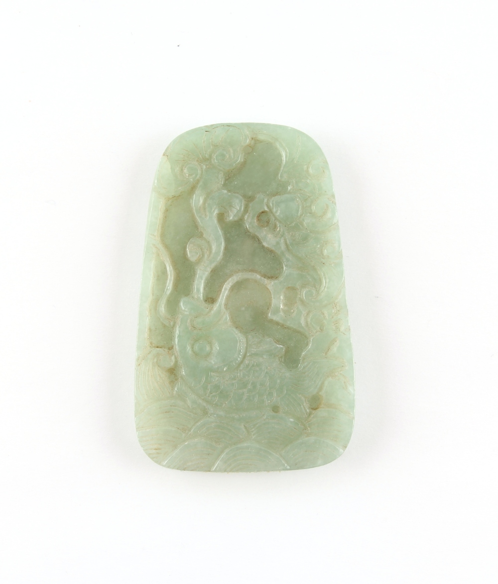 Property of a lady - a Chinese carved jadeite pendant, Qing Dynasty, one side carved with a lion cub