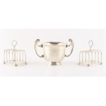 Property of a lady - a pair of silver four division toast racks, Hukin & Heath, Birmingham 1931;