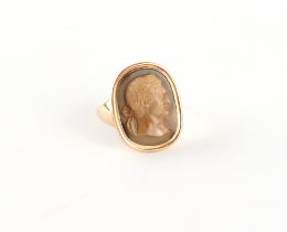 A well carved agate hardstone cameo ring, probably 18th century, depicting a bust of a Roman