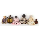 Property of a deceased estate - a group of six dolls including a Norah Wellings black felt doll
