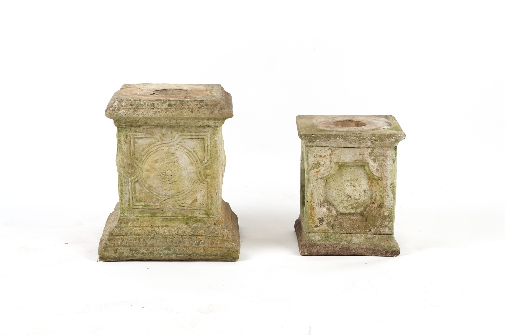 Property of a deceased estate - two weathered reconstituted stone garden plinths, the taller