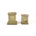 Property of a deceased estate - two weathered reconstituted stone garden plinths, the taller