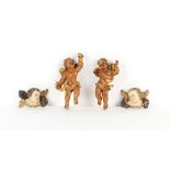 Property of a lady - a pair of Italian carved wood painted & parcel gilt cherubs, approximately