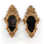 Property of a lady - a pair of late 19th / early 20th century Florentine carved giltwood wall