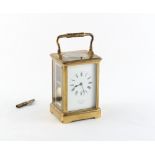 Property of a lady - a late 19th century French brass corniche cased carriage clock, striking the