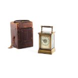 A large late 19th century brass pillars cased grande sonnerie carriage clock, with repeat button,