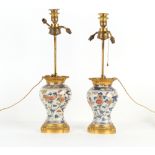 Property of a lady - a pair of Japanese Imari baluster vases, Edo period, 18th century, mounted as