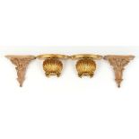 Property of a lady - a pair of gilt painted shell wall brackets, approximately 7.5ins. (19cms.)