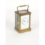 Property of a gentleman - a late 19th / early 20th century brass cased carriage clock, striking