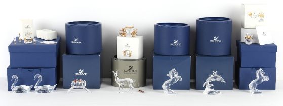 Property of a gentleman - nine boxed Swarovski crystal glass ornaments including a pair of Swans,