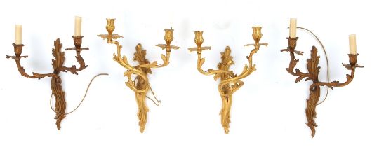 Property of a lady - a pair of late 19th / early 20th century French ormolu rocaille twin light wall