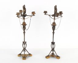 Property of a lady - a pair of late 19th century French silvered metal & gilt brass three light