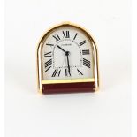 Property of a lady - a Cartier quartz alarm clock, with folding strut, requires new battery, 3.