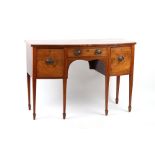 Property of a lady - an early 19th century George IV mahogany bow-fronted sideboard, with six square