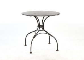 Property of a gentleman - a French Arras or Arras style wrought iron circular topped garden table,