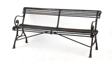 Property of a gentleman - a French Arras or Arras style wrought iron garden bench, with hoof feet,