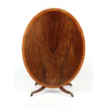 Property of a lady - a George III mahogany & satinwood banded oval tilt-top breakfast table, with