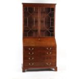 Property of a deceased estate - a George III mahogany fall-front bureau with associated tracery