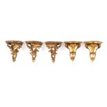 Property of a lady - a set of three Italian Florentine carved giltwood wall brackets, each