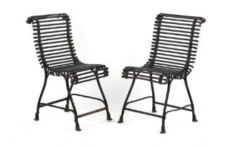 Property of a gentleman - a pair of French Arras or Arras style wrought iron side chairs, with